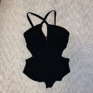 Black halter bodysuit with cutouts